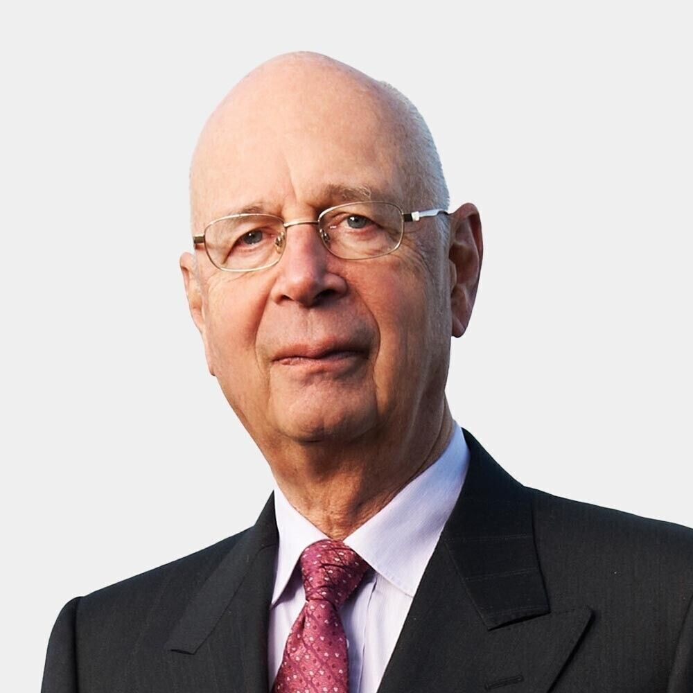 Portrait of Klaus Schwab representing leadership in global digital transformation and innovation