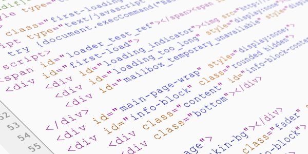 Close-up of software source code displayed on a screen, representing integration development and acceleration tools.