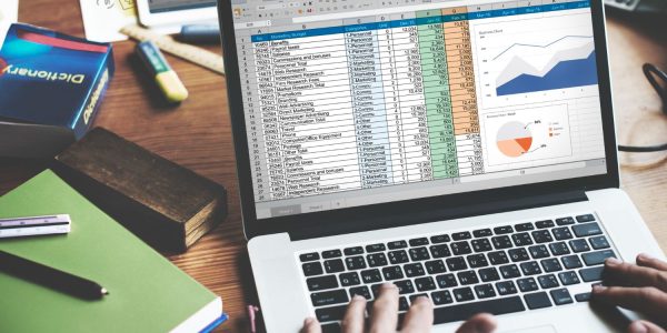 Professional working with structured business data and dashboards using the Code10 CI Accelerator Add-on for SAP Integration Suite.