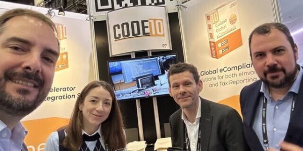 Code10 managing team including Antonio Valladares, Ana Shopovski, Jakub Turminski, and Sergio Martínez at a technology event