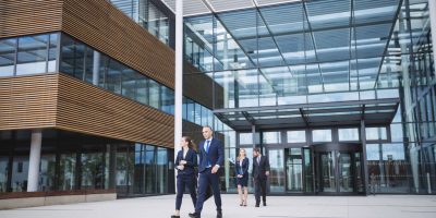 Business professionals in a corporate environment managing digital VAT reporting processes in Germany