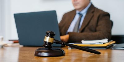 Judge gavel on desk representing legal consequences of non-compliance with TicketBAI regulations