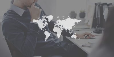 World map representing global coverage and international technology solutions